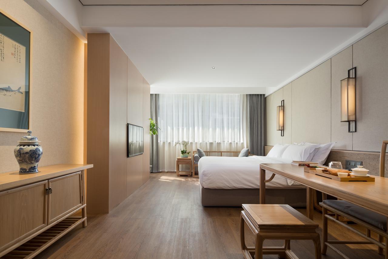 Hotel The Hidden House à Chengdu Extérieur photo